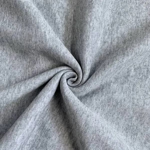 Heather grey fleece fabric twisted into a swirl